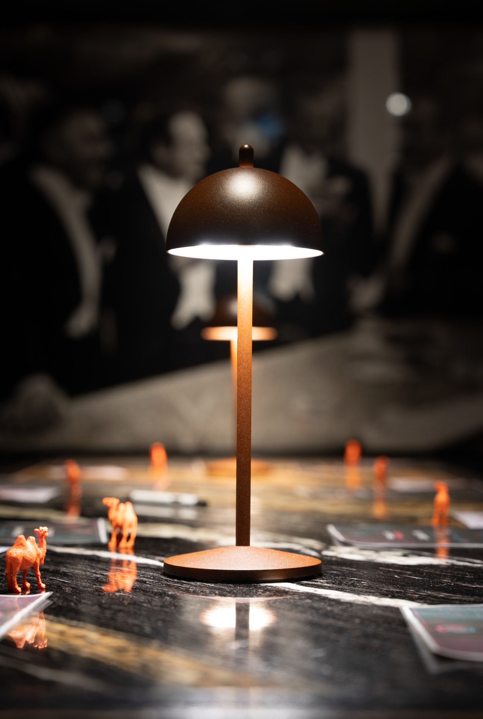 Table lamps and orange camel details at the Digital Camel Data Leaders Roundtable